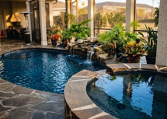 A resurfaced pool deck and replanted terrace after renovation