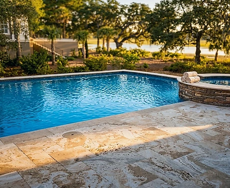 23 Mulberry, Bluffton — a pool under live oaks looking onto the water